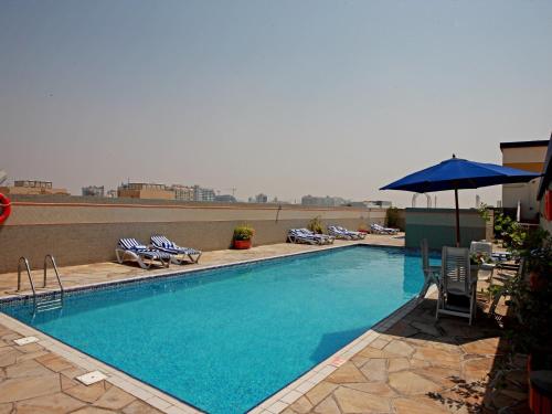 rose garden hotel apartments barsha