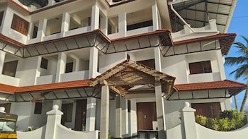 palm tree heritage beach resort