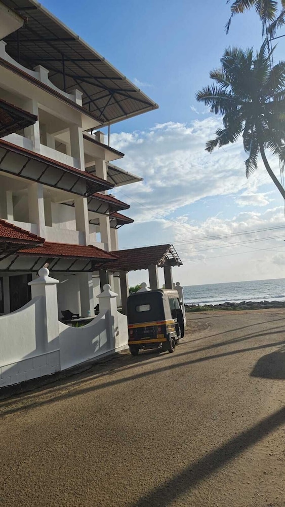 palm tree heritage beach resort