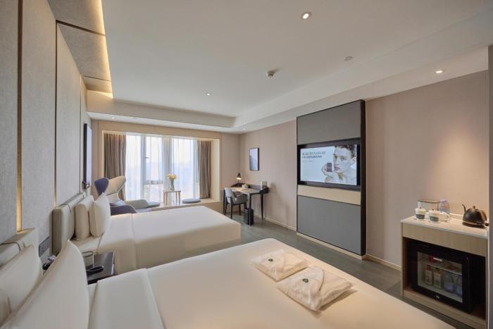 atour hotel taixing municipal government gulou new world
