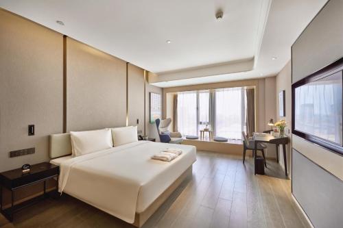 atour hotel taixing municipal government gulou new world