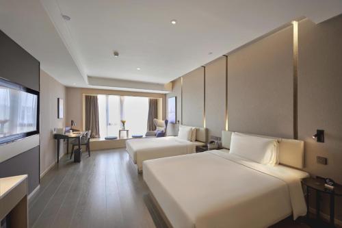 atour hotel taixing municipal government gulou new world
