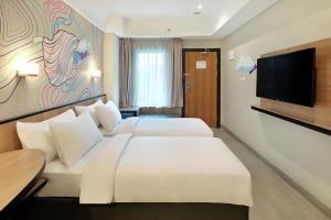 swiss belinn wahid hasyim