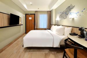 swiss belinn wahid hasyim