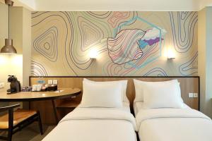 swiss belinn wahid hasyim