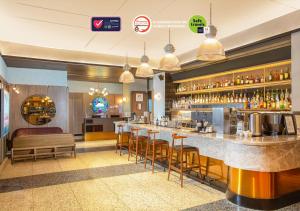 swiss belinn wahid hasyim