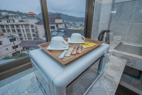 roomquest the peak patong hill