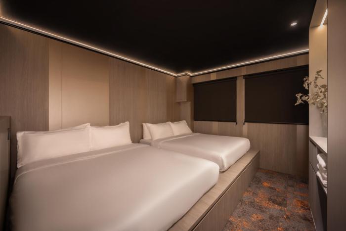 cube social boutique capsule hotel boat quay