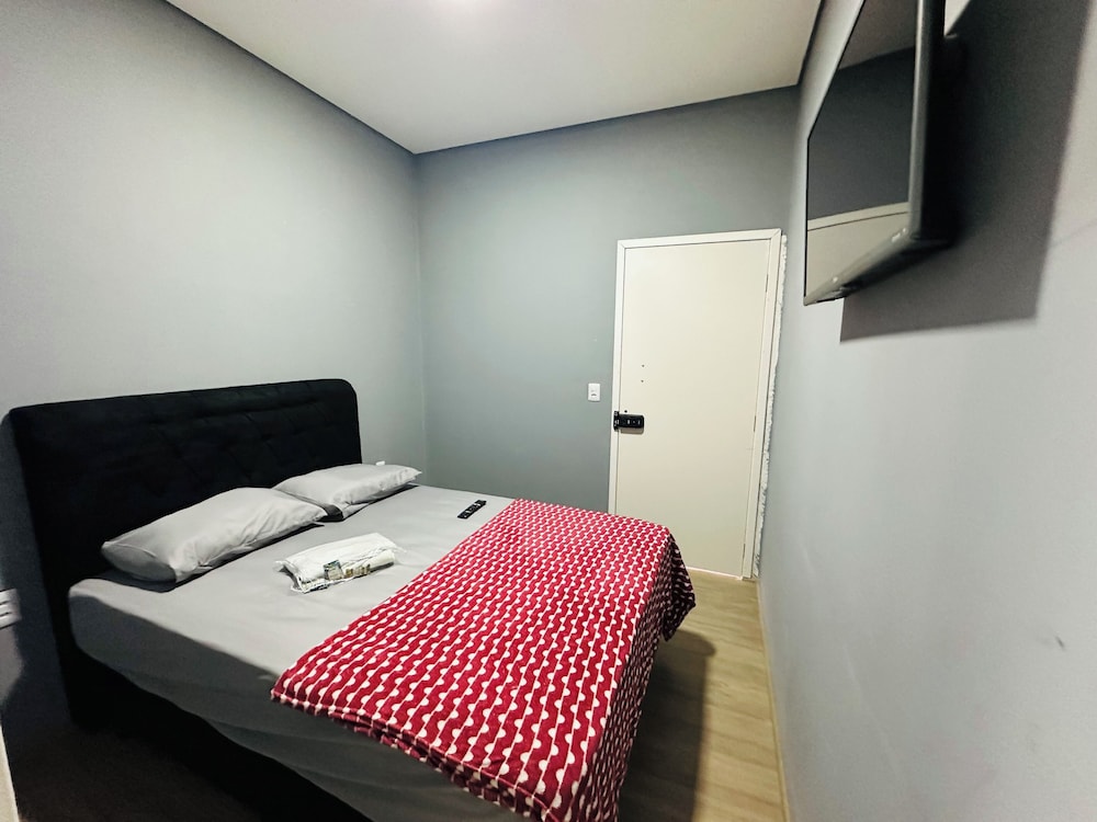 on hostel premium com traslado e cafe