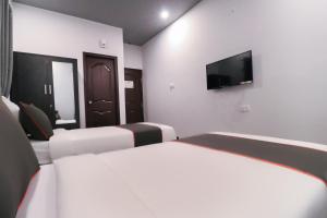 hotel o ira sathyajyothi comfort