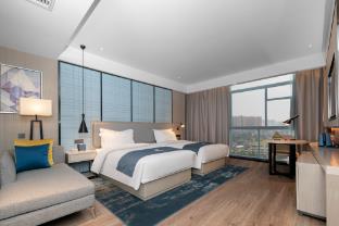 echarm hotel huangshi daye high speed railway station bund capital