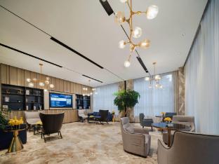 echarm hotel huangshi daye high speed railway station bund capital