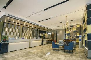 echarm hotel huangshi daye high speed railway station bund capital