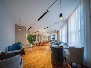 echarm hotel huangshi daye high speed railway station bund capital