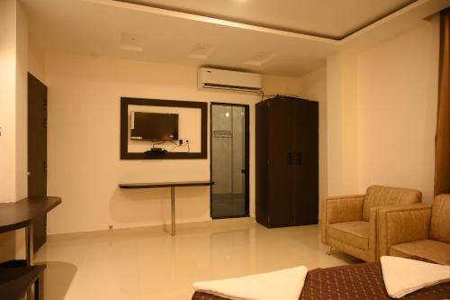 hotel tripti biswanath chariali