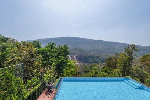 flora misty falls athirappilly