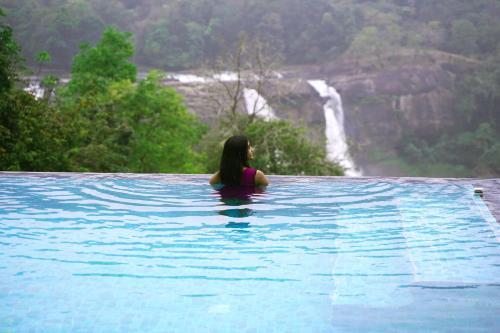flora misty falls athirappilly