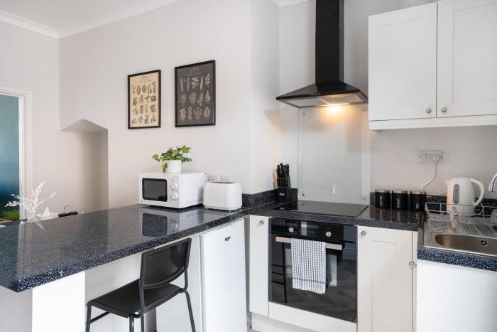 central 2 bedroom house parking