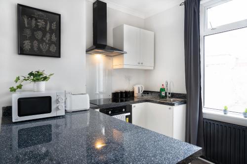 central 2 bedroom house parking