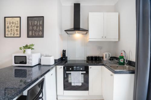 central 2 bedroom house parking