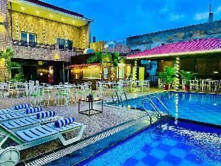 hotel grand udaipur rooftop cafe swimming pool