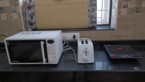 shantham service apartments indumangar