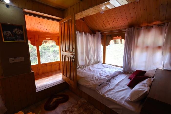 tirthan village resort