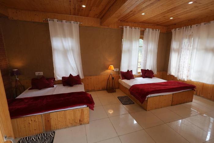 tirthan village resort