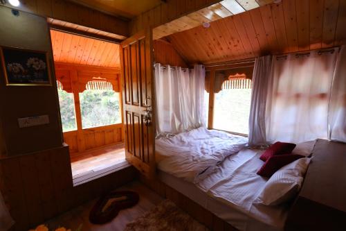 tirthan village resort