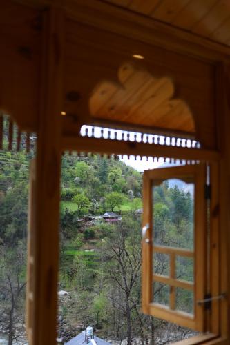 tirthan village resort