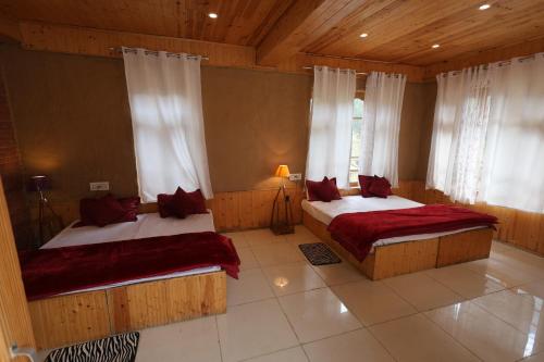 tirthan village resort