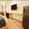pink hotel grand anukampa