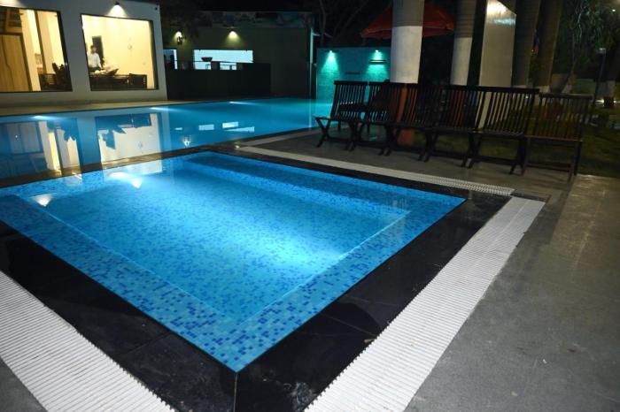 the whispering palms resort