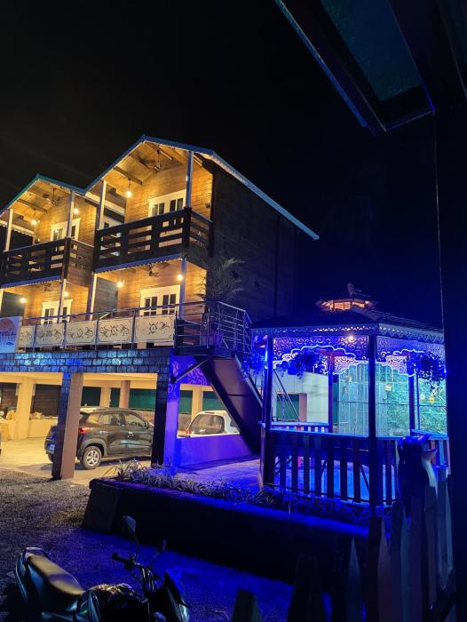 coastal bay inn by green apple stays