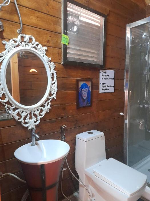 coastal bay inn by green apple stays