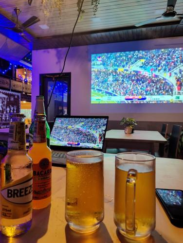 coastal bay inn by green apple stays