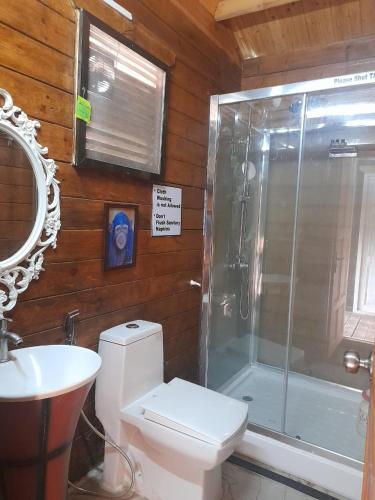 coastal bay inn by green apple stays