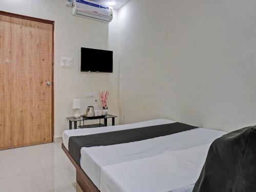Hotel O Nutan Lodging,Serial No. 2/Anutan Lodging, Shree Vihar, Transport Nagar, Nigdi, Pimpri-Chinchwad,4 star