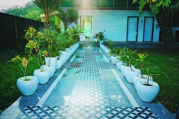 the veda greens resort