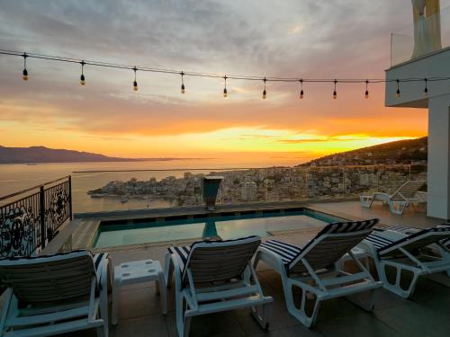 sunset shoreline saranda hotel