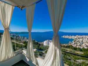 sunset shoreline saranda hotel