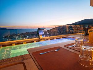 sunset shoreline saranda hotel