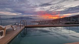 sunset shoreline saranda hotel