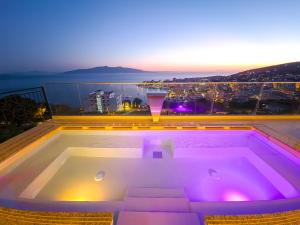 sunset shoreline saranda hotel
