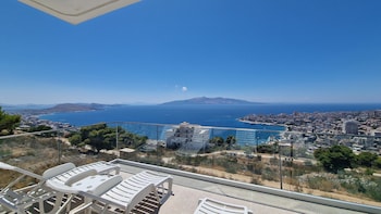 sunset shoreline saranda hotel