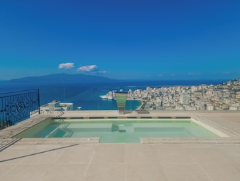 sunset shoreline saranda hotel