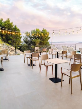 sunset shoreline saranda hotel