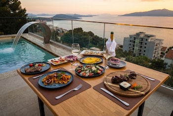 sunset shoreline saranda hotel