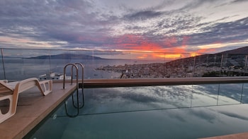sunset shoreline saranda hotel