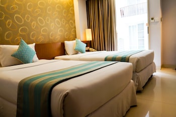 adhi jaya sunset hotel